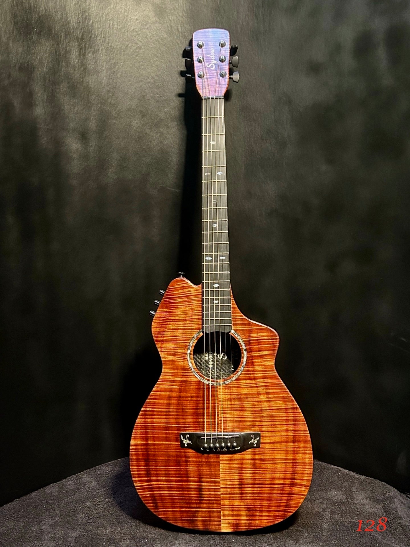 Carbon Fiber body with Koa top Guitar.