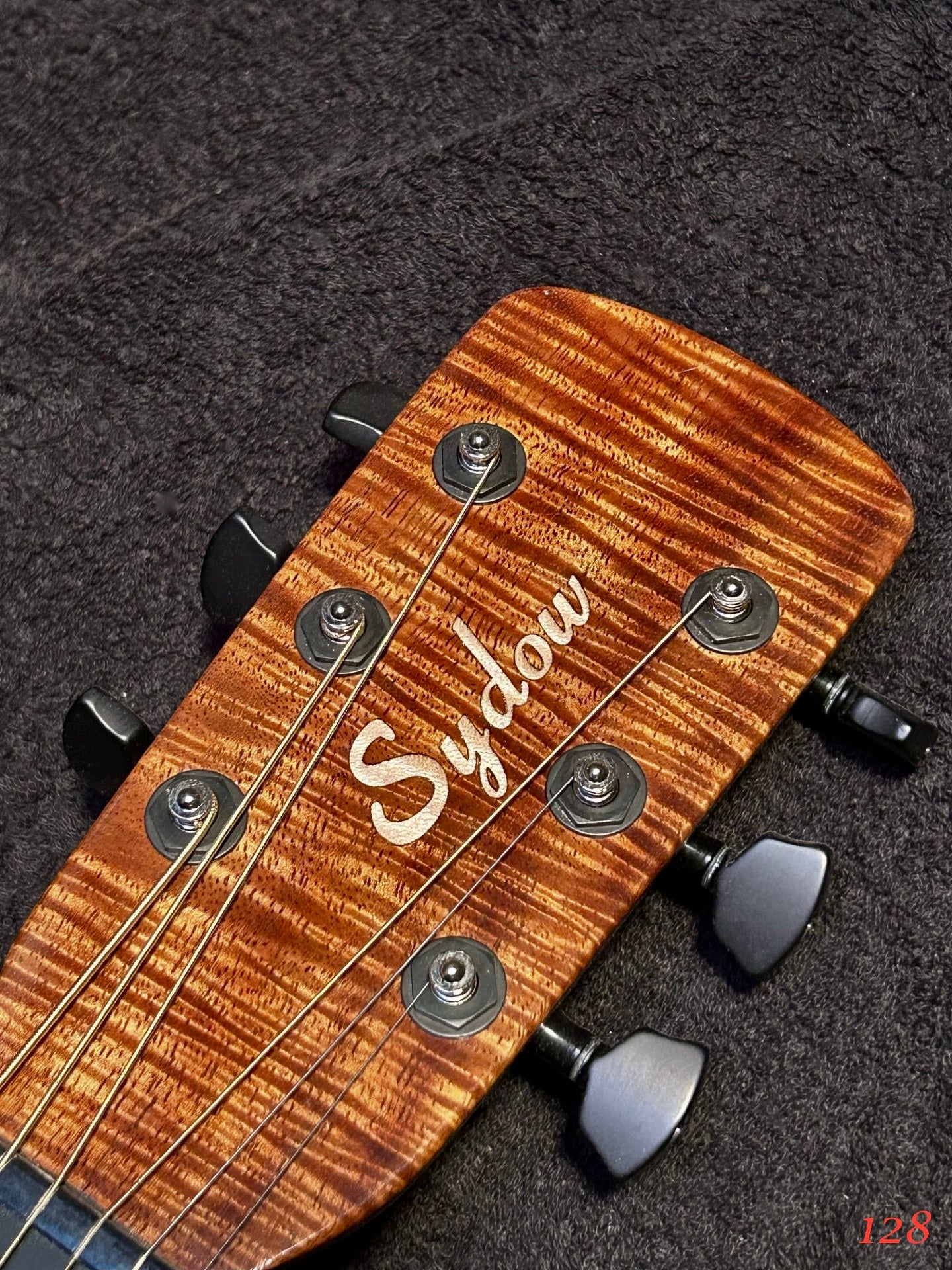 Carbon Fiber body with Koa top Guitar.