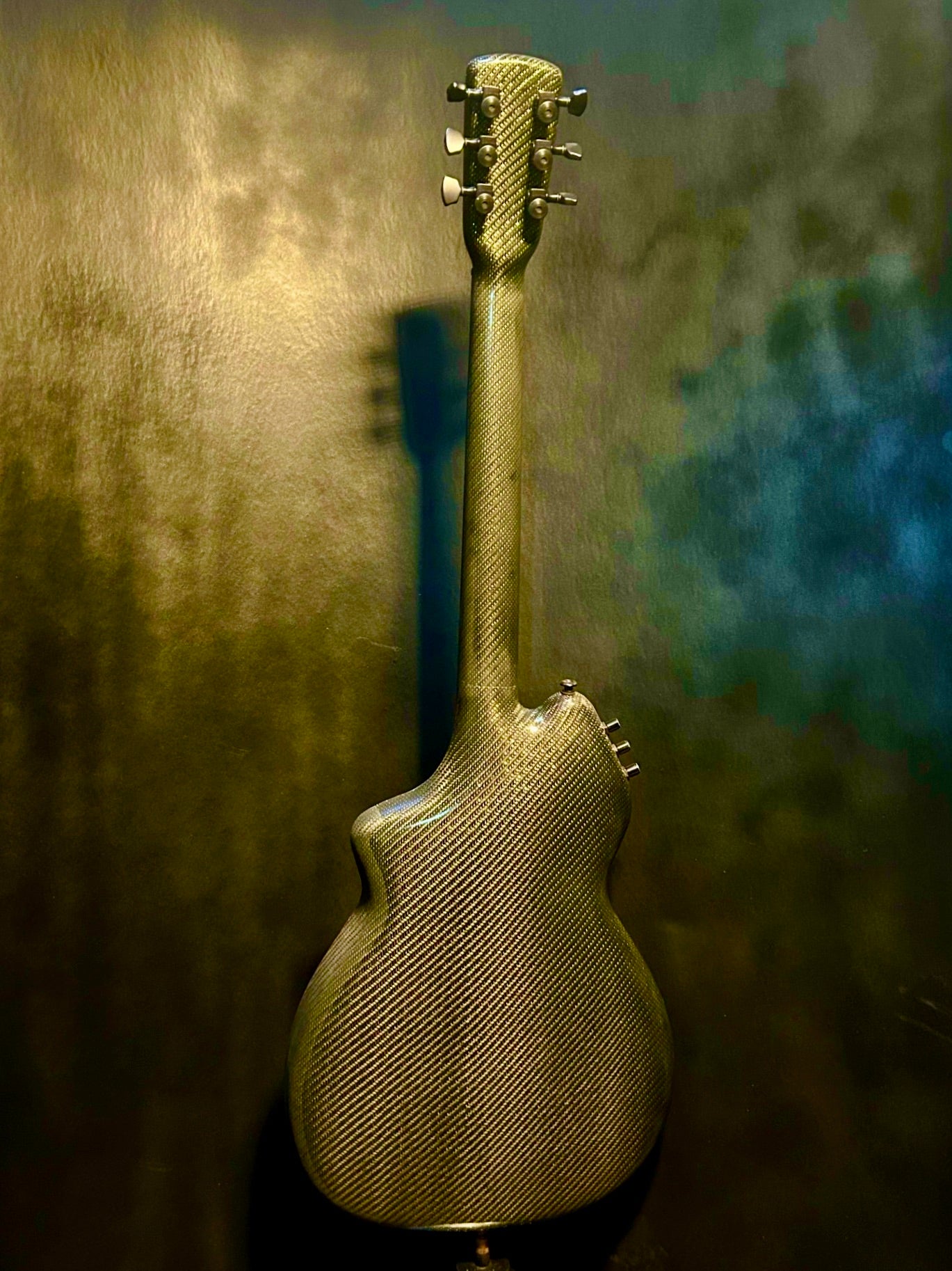 Carbon Fiber body with Koa top Guitar.